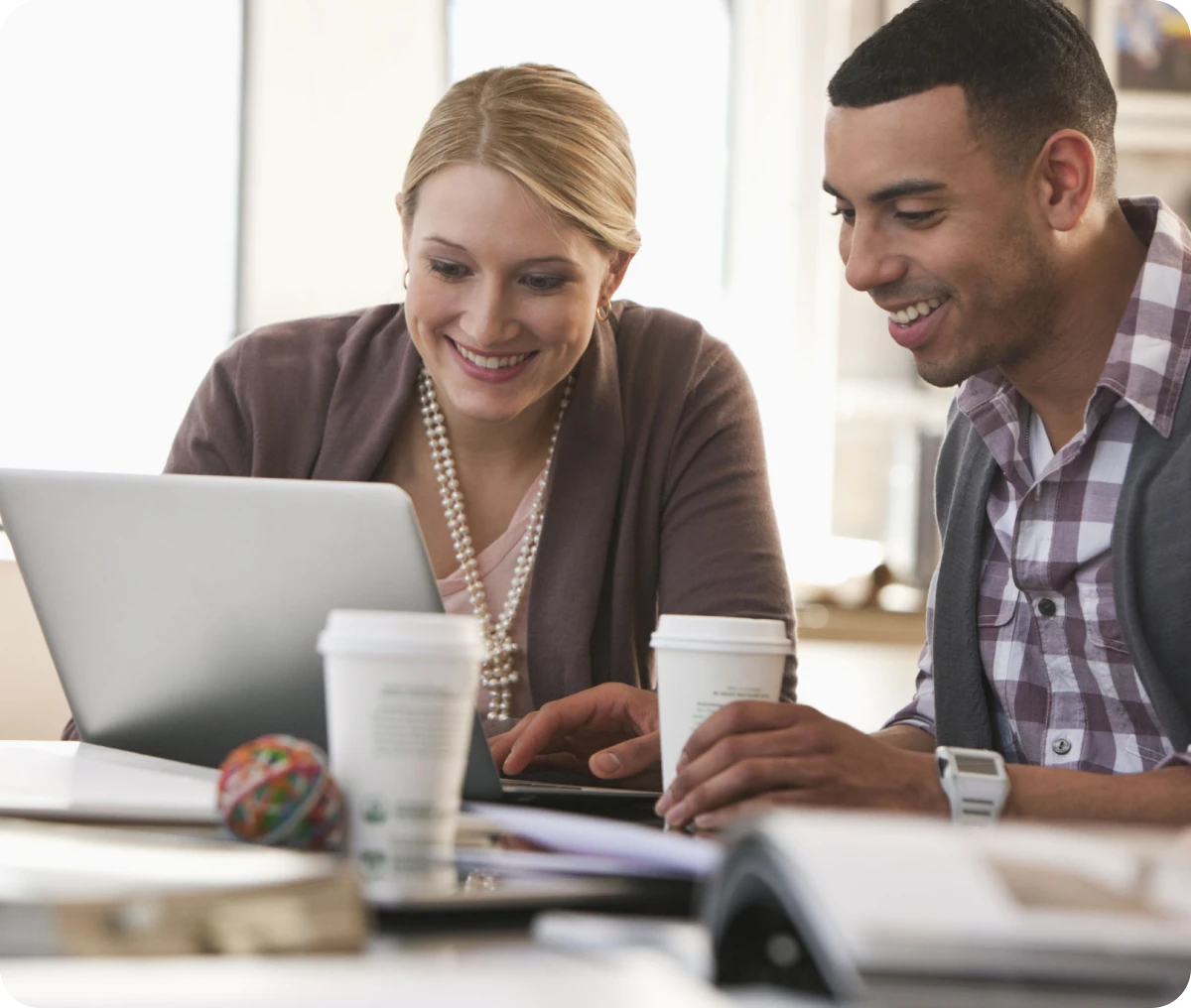 Business meeting with laptop and coffee